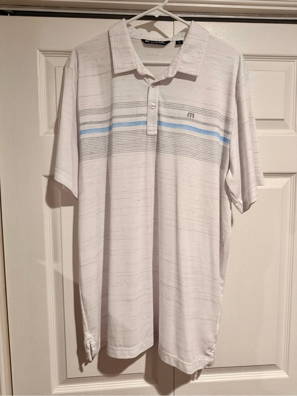 Travis Mathew Lightweight White Polo with Blue Stripe
